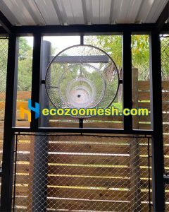 a tunnel made with stainless steel mesh and rings