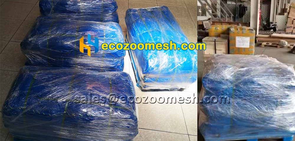 there are four pallets of stainless steel wire rope woven mesh waiting for shipping.