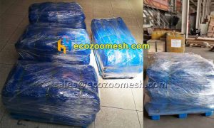 there are four pallets of stainless steel wire rope woven mesh waiting for shipping.