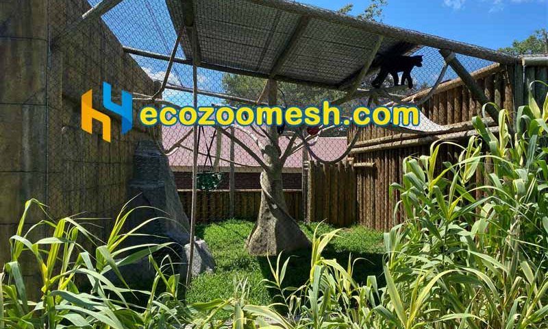 this monkey cage fence made of black steel mesh fence